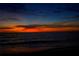 Scenic ocean sunset view with vibrant orange and blue hues in the sky at 9325 Crugar Ter, Englewood, FL 34224