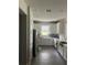 Modern kitchen featuring white cabinets, stainless steel appliances, and lots of counterspace at 10258 Morning Mist Ln, Sarasota, FL 34241