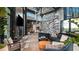 Comfortable lounge area featuring a rock climbing wall and modern decor for community enjoyment at 10258 Morning Mist Ln, Sarasota, FL 34241