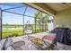 Inviting outdoor space with comfortable seating overlooking a peaceful lake view at 10258 Morning Mist Ln, Sarasota, FL 34241