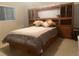 Comfortable bedroom featuring built-in storage and soft, natural lighting at 11029 Vanessa Ave, Englewood, FL 34224