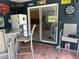 Enclosed patio features dining area and doorway to kitchen visible at 11029 Vanessa Ave, Englewood, FL 34224