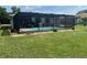 Screened backyard pool with patio is great for relaxing and entertaining at 11029 Vanessa Ave, Englewood, FL 34224