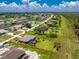 Overhead perspective highlighting the property's location, spacious backyard, pool, and lush landscaping at 1119 Boundary Blvd, Rotonda West, FL 33947