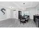 Inviting dining area with stylish decor, wood-look floors, and a welcoming ambiance at 1119 Boundary Blvd, Rotonda West, FL 33947