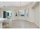 Bright dining area with bay windows offering plenty of natural light at 117 Abercrombie Ave, Englewood, FL 34223