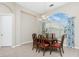 Dining room with traditional wood table and chairs at 117 Abercrombie Ave, Englewood, FL 34223