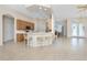Bright kitchen with breakfast bar seating and natural wood cabinets at 117 Abercrombie Ave, Englewood, FL 34223