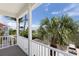 Relax on the balcony with railing and enjoy the beautiful views of the lush, tropical landscaping at 11780 Anglers Club Dr # 107, Placida, FL 33946