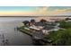 Stunning waterfront home with private boat dock and landscaped grounds, perfect for waterfront living at 12438 Prather Ave, Port Charlotte, FL 33981