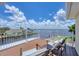 Relax on this deck with seating and water views at 12438 Prather Ave, Port Charlotte, FL 33981