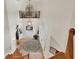 High angle view of the light and bright two-story foyer with travertine flooring at 12438 Prather Ave, Port Charlotte, FL 33981
