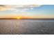 Beautiful sunset over the water, offering scenic views and a tranquil atmosphere at 12438 Prather Ave, Port Charlotte, FL 33981