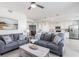 Inviting living room with stylish decor and open kitchen at 12550 Galapagos Ct # 104, Venice, FL 34293