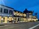 Wellen Park town center with people walking along the main street, shops and restaurants at 12550 Galapagos Ct # 104, Venice, FL 34293