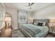Cozy bedroom with neutral tones, a plush bed, and soft lighting at 1269 N Lavina St, North Port, FL 34286