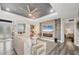 Spacious living room with fireplace and decorative stone surround at 1269 N Lavina St, North Port, FL 34286