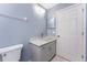 Bathroom with updated vanity, modern sink, and tile flooring at 127 Jennifer Dr, Rotonda West, FL 33947