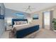 Cozy bedroom with a statement headboard, bright natural light, and neutral walls at 127 Jennifer Dr, Rotonda West, FL 33947