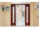 Inviting entryway with high ceilings, tile floors, and decorative accents at 127 Jennifer Dr, Rotonda West, FL 33947
