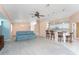 Open-concept living area with a breakfast bar and seamless flow to the kitchen and other living spaces at 127 Jennifer Dr, Rotonda West, FL 33947