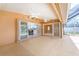Spacious screened lanai offers views of the interior and pool area at 127 Jennifer Dr, Rotonda West, FL 33947