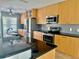 Well-equipped kitchen with stainless steel appliances and ample cabinet space at 133 Paddington Rd, Venice, FL 34293