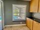 Well-lit kitchen area with cabinets, countertops and window views at 133 Paddington Rd, Venice, FL 34293