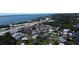 Aerial view highlighting this community with homes nestled among the trees near the water at 1401 S Mccall Rd # 101, Englewood, FL 34223