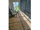 A tiled patio with patio seating offering an inviting outdoor space to relax and enjoy the views at 1401 S Mccall Rd # 101, Englewood, FL 34223
