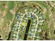 Aerial view of property with canal, golf course, and community layout featuring numbered lot lines at 15 Bunker Pl, Rotonda West, FL 33947