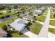 Aerial view of a quaint neighborhood with canal access, offering serene waterfront living at 15 Bunker Pl, Rotonda West, FL 33947