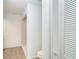 A stylish bathroom with a toilet, shower and a closet to store bathroom essentials at 15 Bunker Pl, Rotonda West, FL 33947