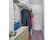Walk-in closet with shelving and clothing, offering ample storage space at 15 Oakland Hills Pl, Rotonda West, FL 33947