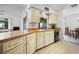 Kitchen with wood countertops, white cabinets, and a black dishwasher at 15 Oakland Hills Pl, Rotonda West, FL 33947