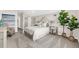Spacious Primary bedroom featuring lots of light, furniture, and modern decor at 15521 Lakeland Cir, Port Charlotte, FL 33981