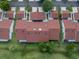 Aerial view of the villa features a tile roof and walkway in golf community at 1640 Atares # 23, Punta Gorda, FL 33950