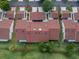 Aerial view of the villa features a tile roof and walkway in golf community at 1640 Atares # 23, Punta Gorda, FL 33950