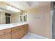 Bathroom featuring a long vanity with a sink and a shower at 1640 Atares # 23, Punta Gorda, FL 33950