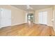 Bedroom with wood floors, closet, and ceiling fan. Doorways lead to other rooms at 1640 Atares # 23, Punta Gorda, FL 33950