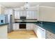 Kitchen featuring stainless steel appliances, ample cabinetry and sink at 1640 Atares # 23, Punta Gorda, FL 33950