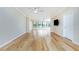 Bright living room featuring hardwood floors and a large window with a view at 1640 Atares # 23, Punta Gorda, FL 33950