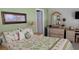 Comfortable bedroom with matching dresser and decor at 1760 Gulf Blvd # 511, Englewood, FL 34223