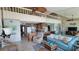 Spacious living space with a loft, kitchen, spiral staircase, and cozy living area with ample seating at 1760 Gulf Blvd # 511, Englewood, FL 34223
