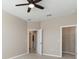Bedroom features view into other rooms, carpet, and access to closet at 17605 Boracay Ct # 201, Venice, FL 34293
