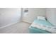 Neutral bedroom with carpet, ceiling fan, window with blinds, and small bed at 17921 Grand Prosperity Dr, Venice, FL 34293