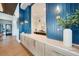 Community clubhouse lounge area with counter, cabinets, and elegant decor at 17921 Grand Prosperity Dr, Venice, FL 34293