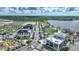 An attractive modern town center features a variety of shopping and community event spaces along a scenic waterfront at 17921 Grand Prosperity Dr, Venice, FL 34293