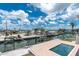 Beautiful backyard overlooking a canal with a boat lift and pool at 1930 Massachusetts Ave, Englewood, FL 34224