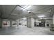 Expansive basement with concrete floors and ample storage space at 1930 Massachusetts Ave, Englewood, FL 34224